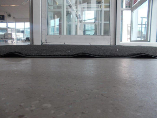 Corrugation of loose laid mats.