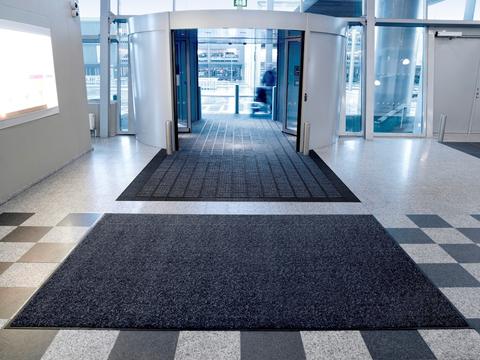 Benefits of owning versus renting dust mats